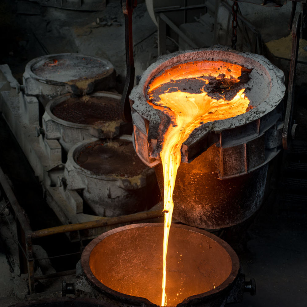 Tank pours liquid metal at the steel mill