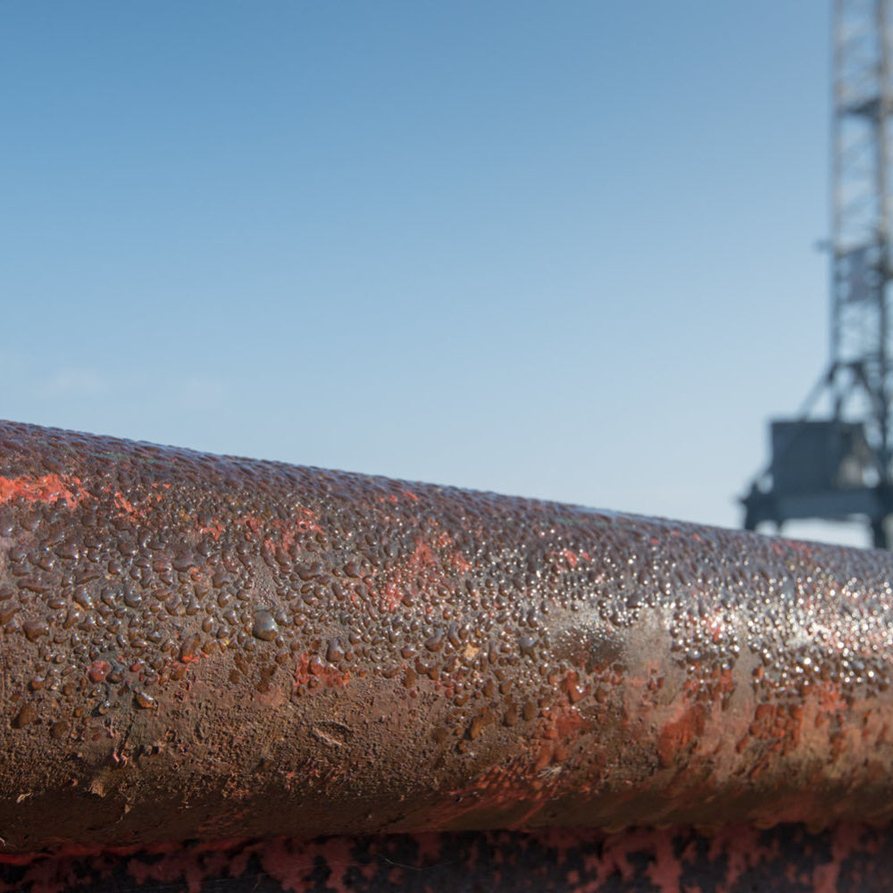 Rusty steel tube shipyard crane