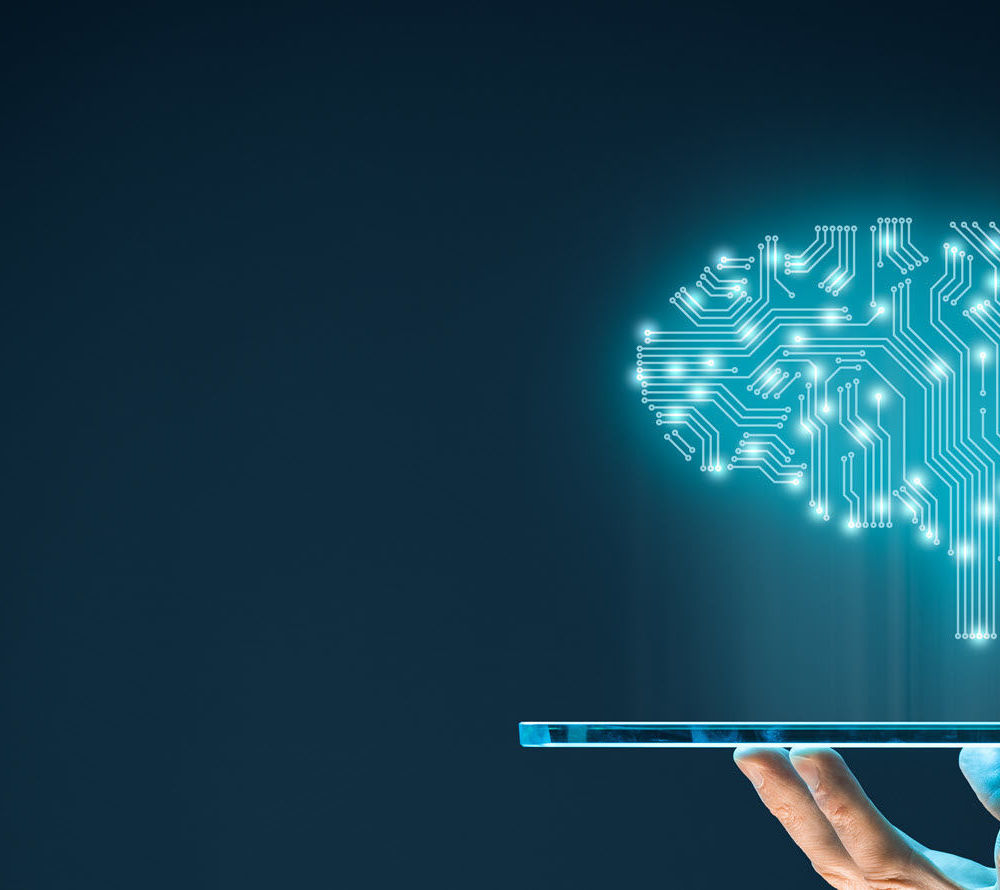 Brain representing artificial intelligence and businessman holding futuristic tablet