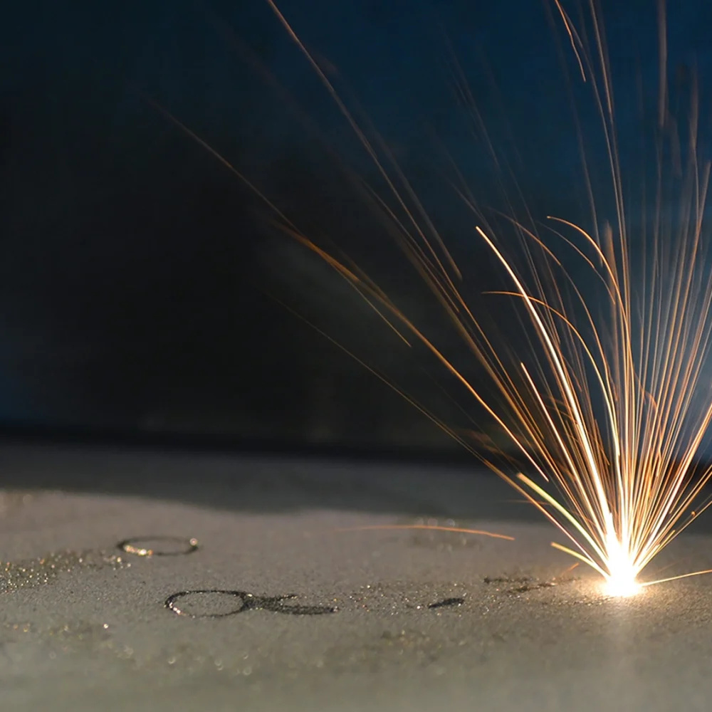 A laser sintering machine for metal. Concept image representing Thermo-Calc's additive manufacturing simulation software: the Additive Manufacturing Module